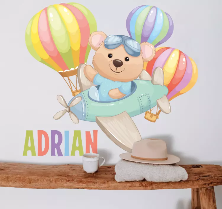 Mielas lokys lėktuve su balionų lipduku - „Tenstickers“